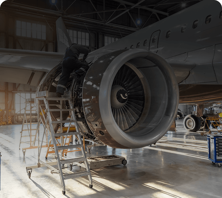 Aircraft engine turbine components being measured in an aerospace facility