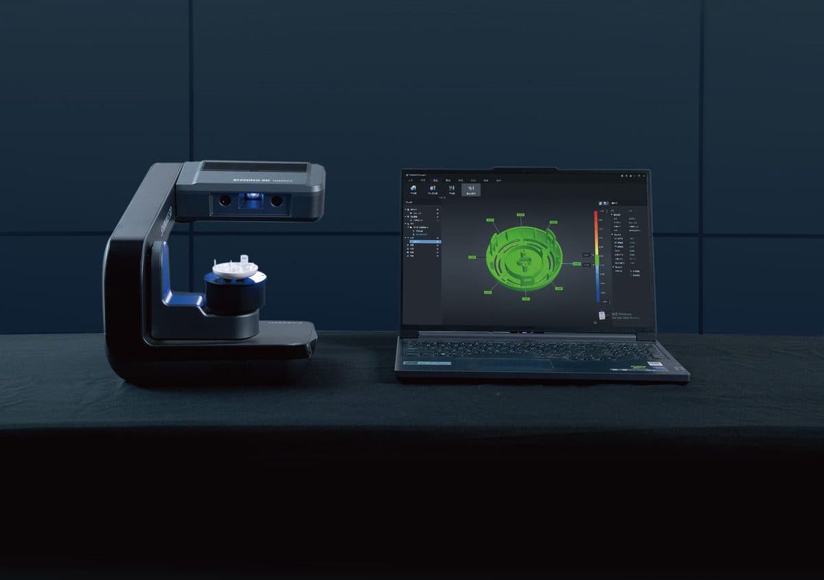 AutoScan Inspec2 beside a laptop running SHINING3D Inspect